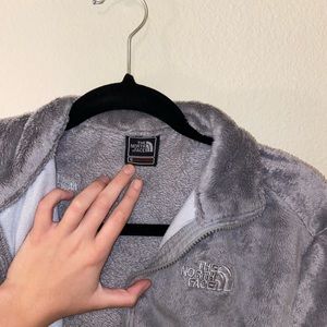 grey fluffy north face summit series jacket